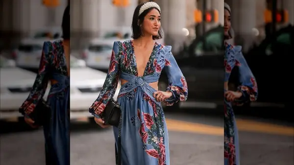 Woman in a blue cutout dress 