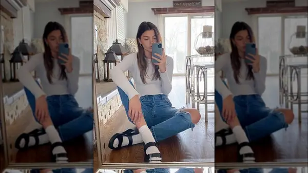 woman wearing socks and sandals