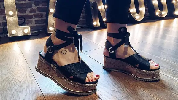 woman wearing flatforms