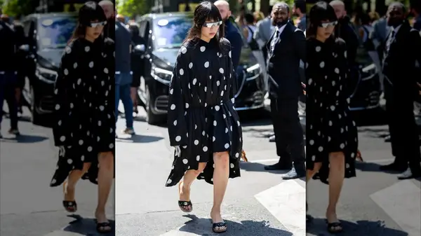 Woman wears polka dot dress