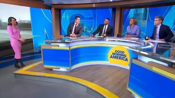 Ginger Zee on Good Morning America in a pink dress