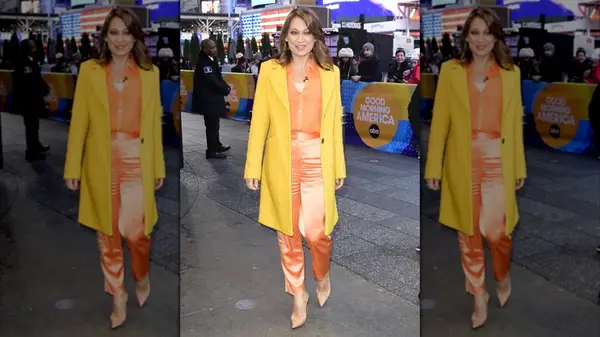 Ginger Zee in a yellow and orange outfit