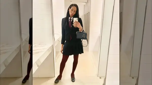 Woman posing in the mirror