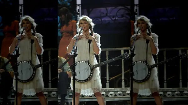 Swift wearing white dress