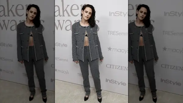 Kristen Stewart in a black and white suit