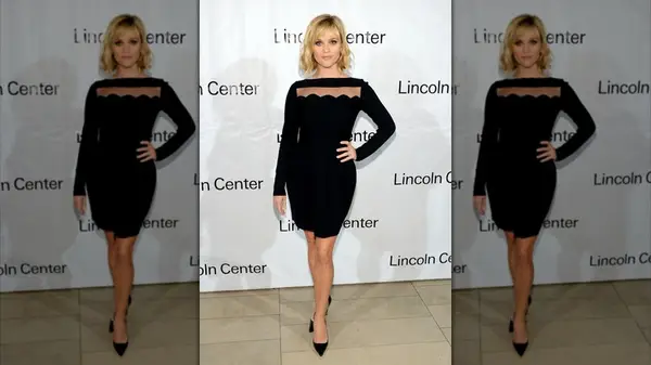 Reese Witherspoon in a black dress with sheer panel