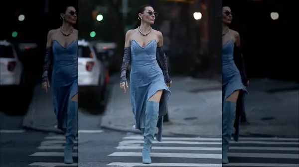 A woman wearing denim boots 