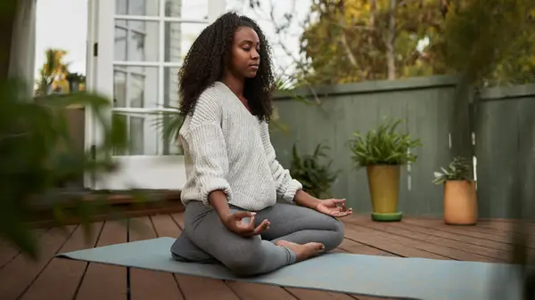 Meditating in leggings