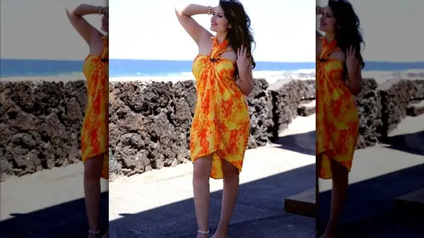 woman in orange sarong dress