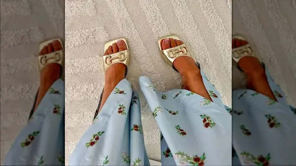 Person wearing mules