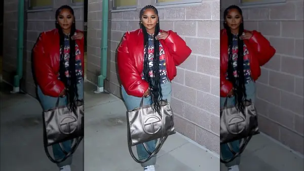 Woman holding an oversized bag