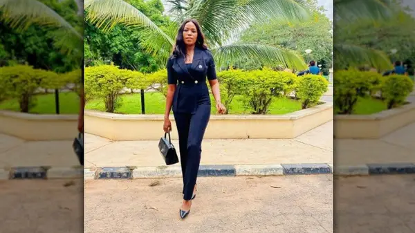 Woman in a black jumpsuit