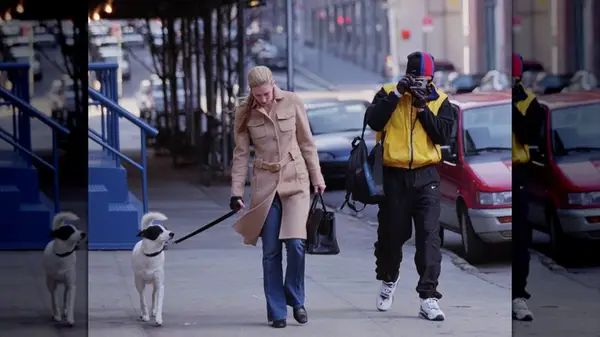 Carolyn Bessette-Kennedy walking Friday the dog in New York City