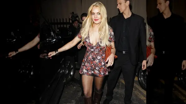 Lindsay Lohan wearing black tights