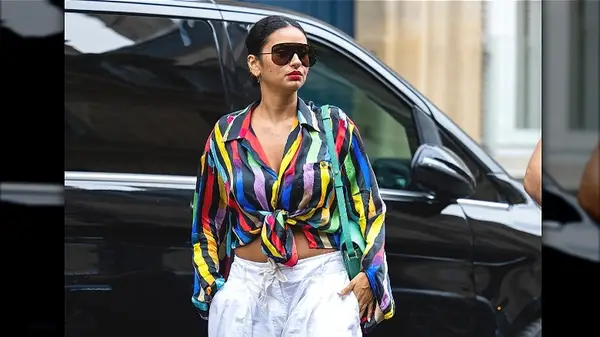 colorful striped top on model