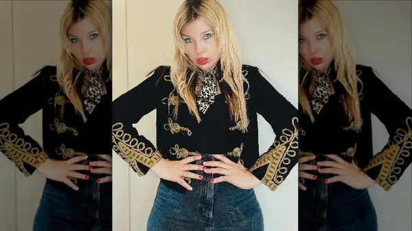 Person in embroidered jacket