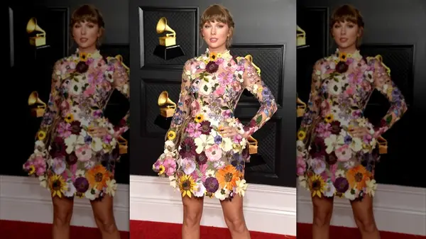 Taylor Swift on the red carpet in a floral mni dress