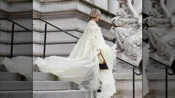 Fashion week guest in butter yellow