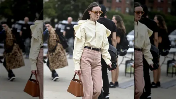 Woman in light pink jeans