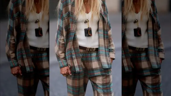 A woman wearing matching plaid 