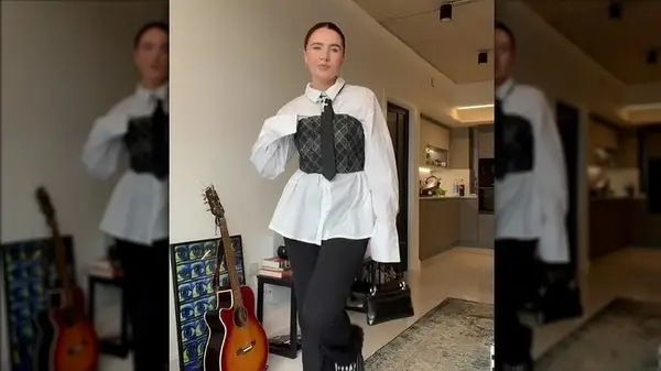 Woman in corset and tie