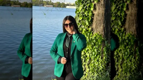 Woman in blazer and tie