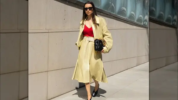 A woman in butter yellow tones 