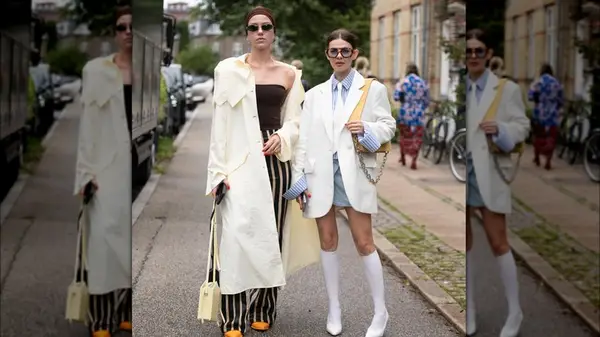 Two women in outfits 
