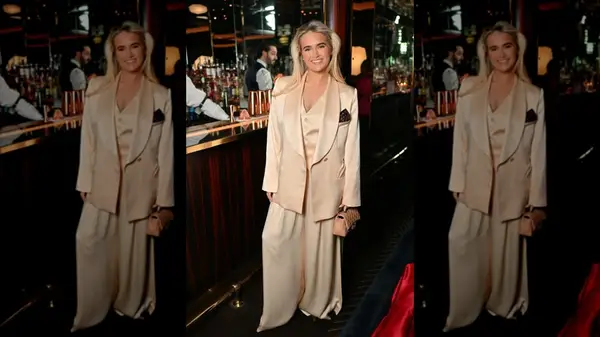 Molly Mae in champagne-soaked suit