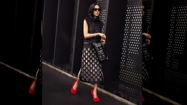 Woman with red fluffy shoes 