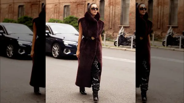 Woman in a furry vest 