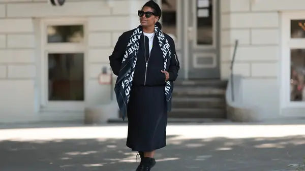 woman in black slip skirt