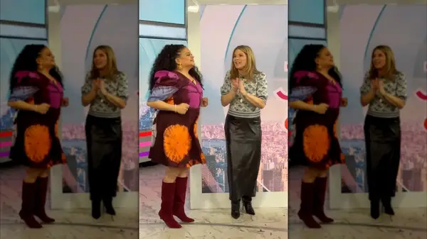Jenna Bush Hager standing on a television set with Michelle Buteau