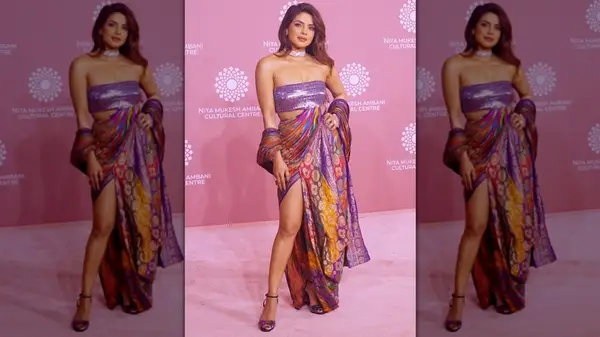 Priyanka Chopra posing in a colorful dress at a 2023 event