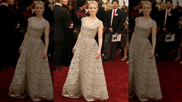 Reese Witherspoon looking off-frame while wearing a champagne colored gown
