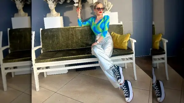 Woman in metallic pants