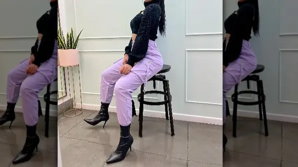 Woman in lavender pants