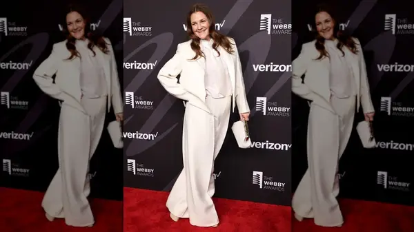 Drew Barrymore wearing an all-white suit at the 26th Annual Webby Awards
