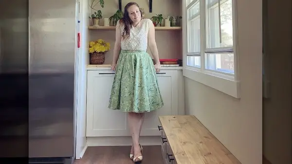 Woman at counter in circle skirt