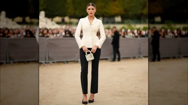 Woman in black and white suit 