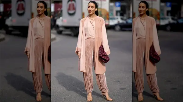 Woman in pink pant suit 