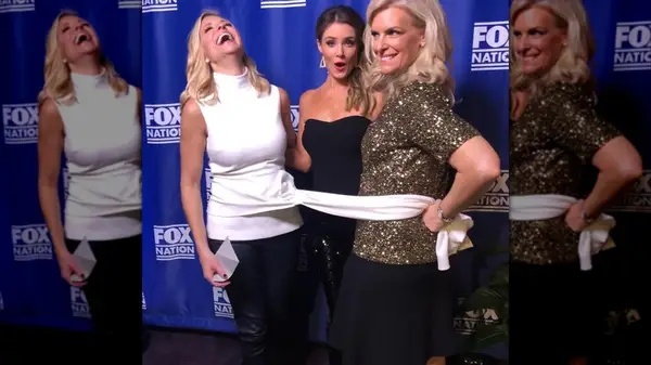 Ainsley Earhardt in a white top and black pants