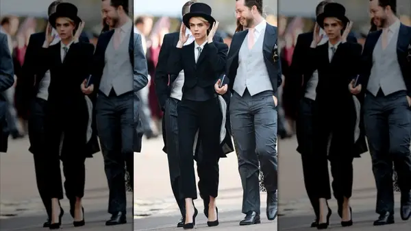 Cara Delevingne in a suit and top hat