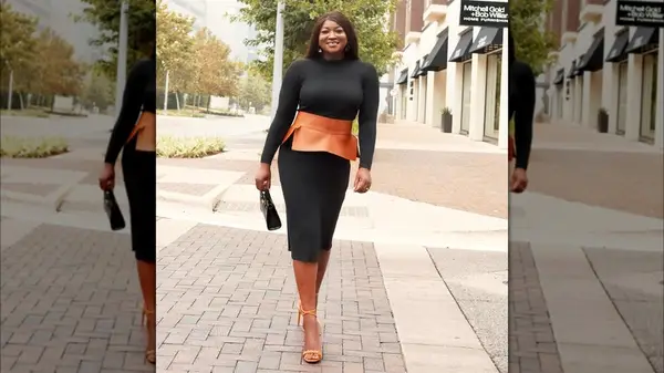 Woman wearing a peplum belt