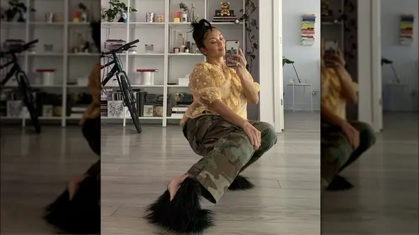 woman wearing furry shoes selfie 