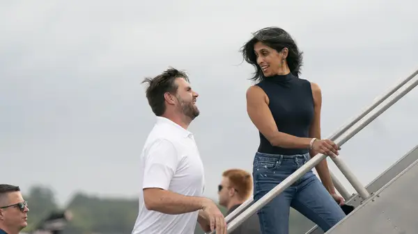 Usha Vance stepping onto a plane