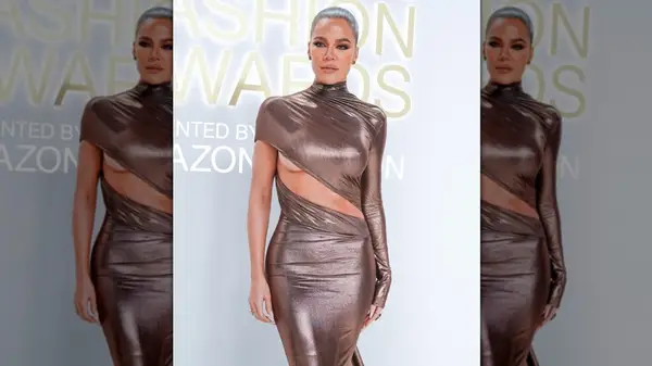 Khloe Kardashian wearing a metallic dress on the red carpet