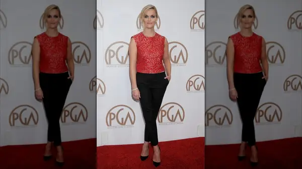 Reese WItherspoon on the red carpet in trousers