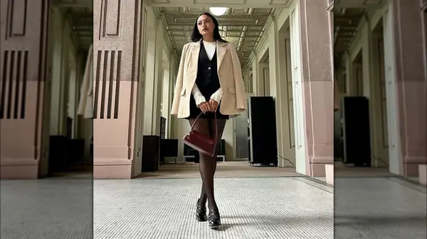 Woman wearing Mary Janes and tights