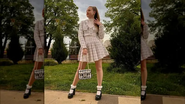 Woman wearing black Mary Janes